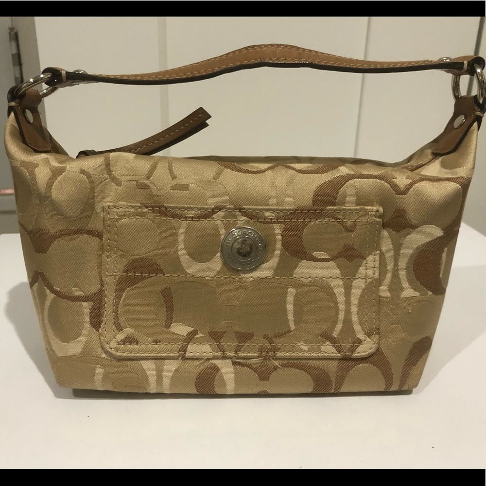 Coach embossed tan handbag $45